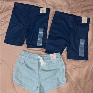 3 pairs of Girls Garanimals Shorts for $11- Size 4T. Comes with 3 free t shirts.
